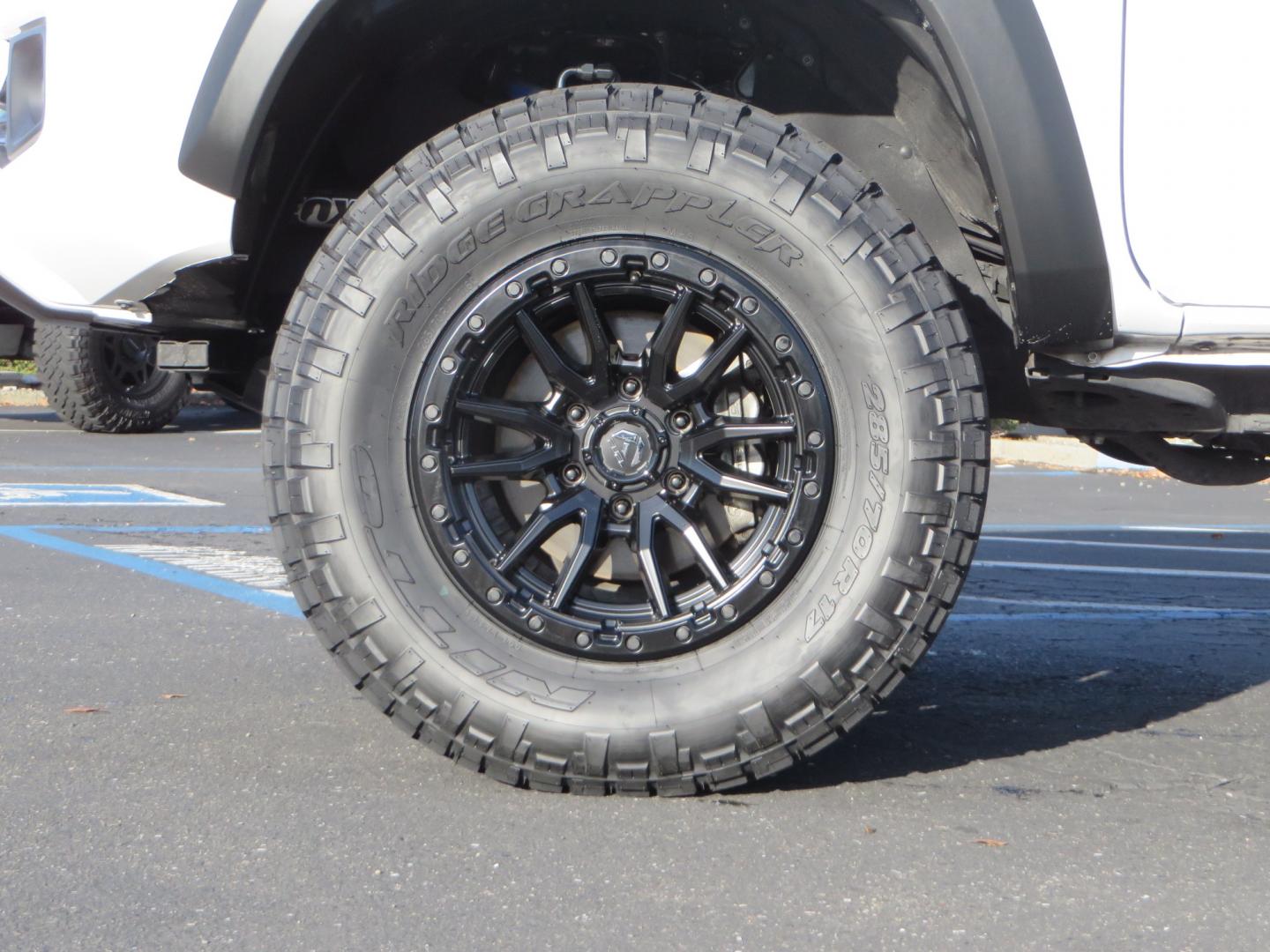 2019 White /black Toyota Tacoma TRD OFF-ROAD Double Cab (3TMAZ5CN4KM) with an 3.5L engine, automatic transmission, located at 2630 Grass Valley Highway, Auburn, CA, 95603, (530) 508-5100, 38.937893, -121.095482 - TRD Offroad 2WD sitting on Fox 2.5 remote reservoir DSC Coil-overs, Total Chaos upper control arms, Rigid Industries Dually side shooter leds, Fuel Rebel wheels, Nitto Ridge Grappler tires, and window tint. - Photo#8